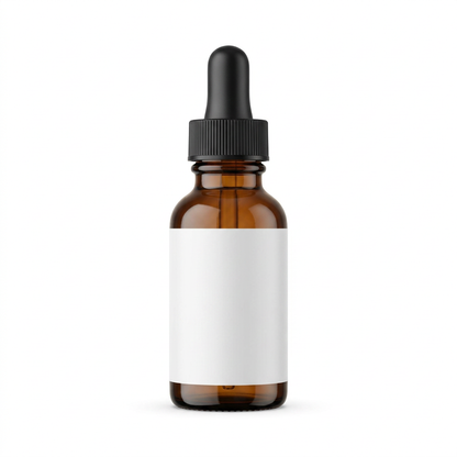 Unbranded amber glass serum bottle with black dropper and blank white label on a white background